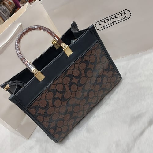 شنطه نسائي راقي تصميم كوتش