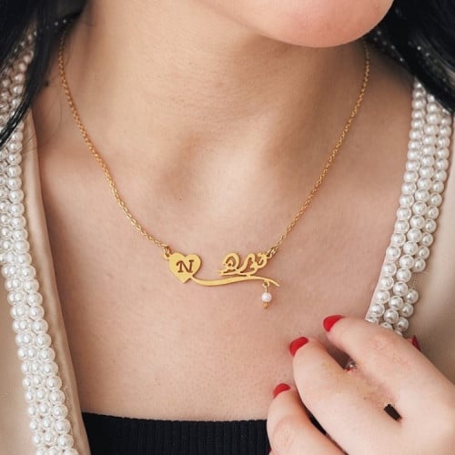 سلسال ذهب مخصص بالأسماء مع حرف داخل قلب