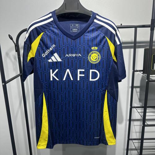 طقم نادي النصر الاحتياطي 2025 كحلي بخطوط صفراء أني...