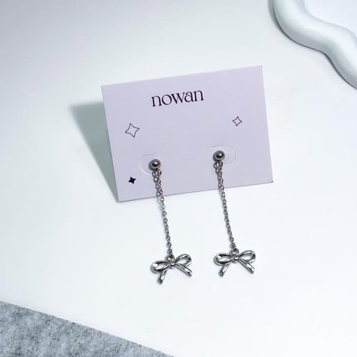 أقراط طويل مع تشارم الفيونكة الفضية | Bowknot long...