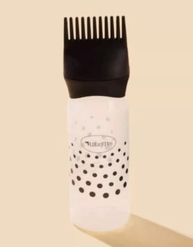 زجاجة شامبو نمط نقاط البولكا