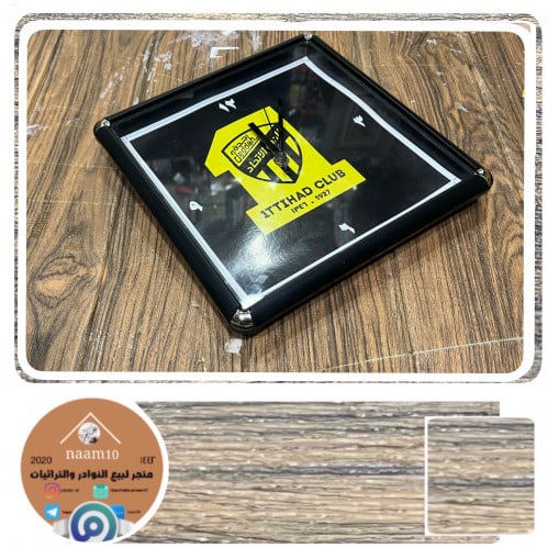 ساعة بشعار نادي الاتحاد شغالة - الصين