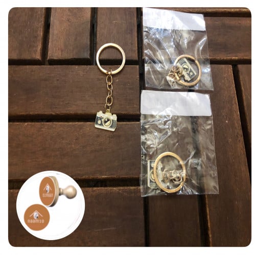 ميدالية مفاتيح عبارة عن كاميرا