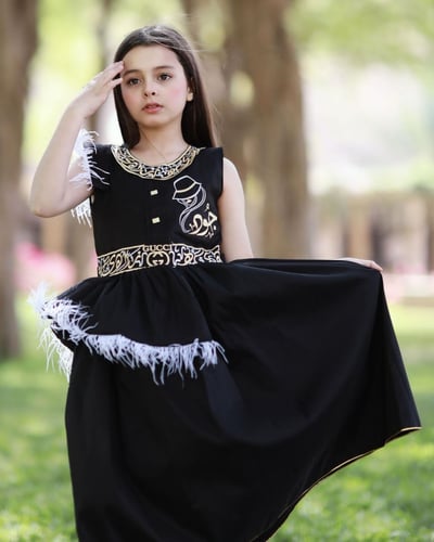 فستان الحرف العربي