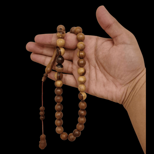 سبحة من خشب البندق نحت دائري 33 خرزة