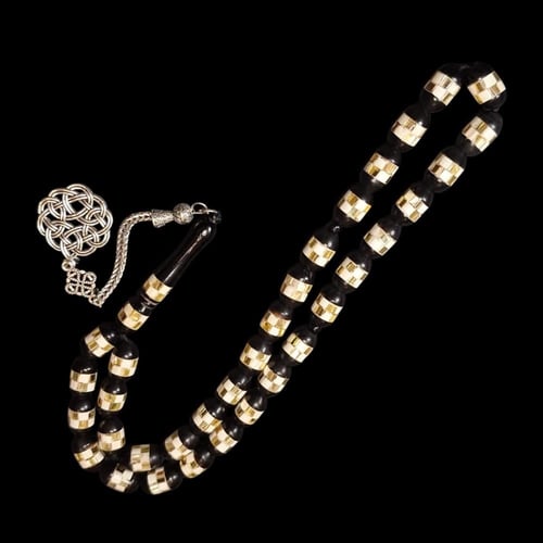 سبحة من خشب الكوك 33 خرزة تطعيم جميل