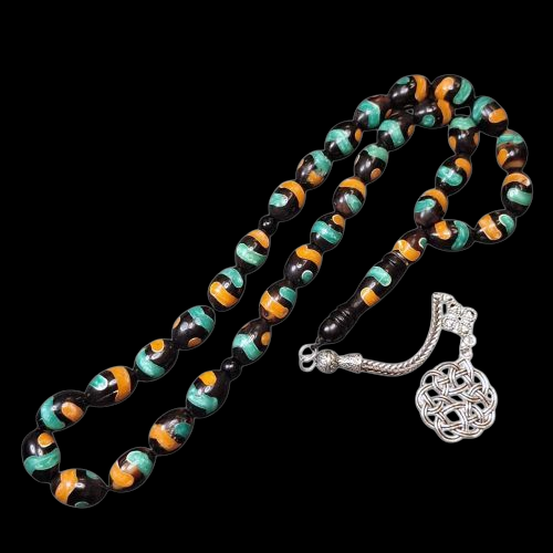 سبحة من خشب الكوك 33 خرزة مطعمه بلونين كركوشة معدن...