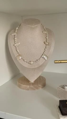The necklace is called "with a certificate from Th...