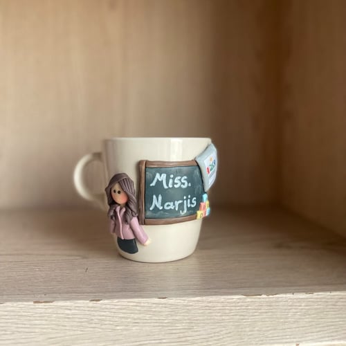 كوب المعلمة