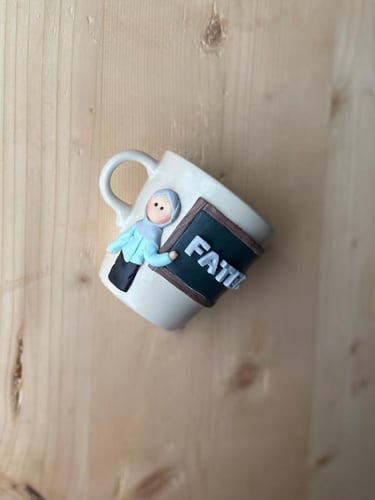 كوب المعلمة