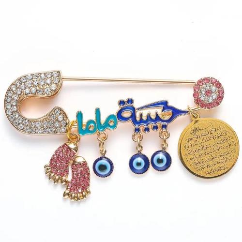 بروش أطفال مطلي بالذهب