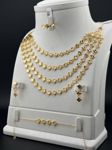 طقم ذهب فخم عيار 21 بتصميم أنيق وزن 28.16 جرام