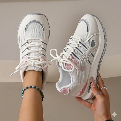 Women's white sports shoe