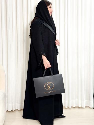 (0016) Black jacquard abaya, luxurious, with an elegant collar, and satin silk sleeves