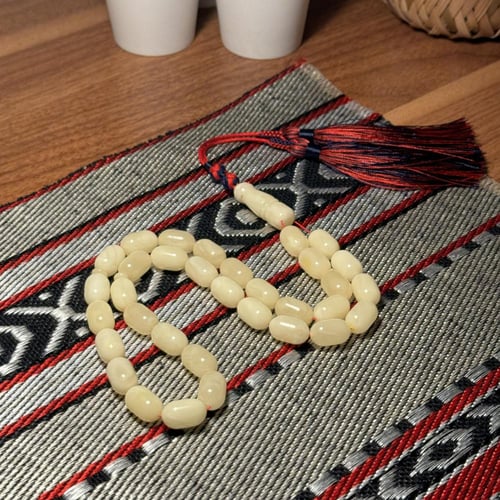 مسباح كهرمان ابيض معجن