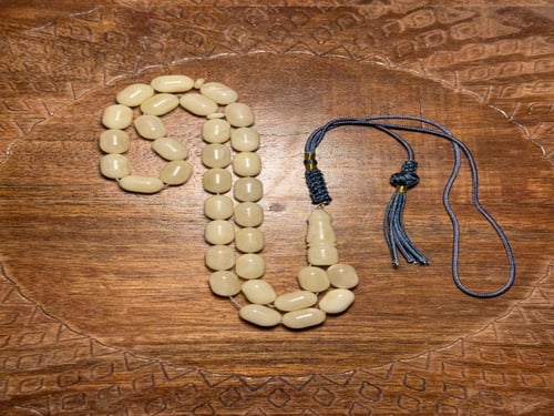 مسباح كهرمان ابيض معجن