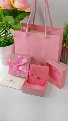 A necklace including accessories