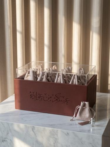 توزيعات مسك ( 24 قطعة) عنابي