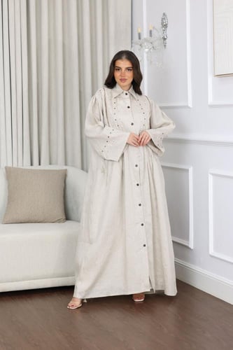 جلابية لينن بكسرات وتطريز شك في الصدر والاكمام