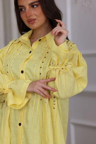 جلابية لينن بكسرات وتطريز شك في الصدر والاكمام