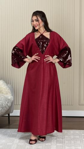 جلابية لينن ممزوجة بالترتر اللماع في الصدر والاكما...