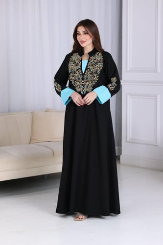 جلابية لينن بتطريز شك يدوي فاخر في الصدر