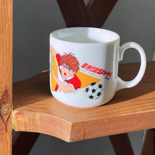 كوب سيراميك صناعة يابانية فنتج ونادر يحمل رسوم لشخ...