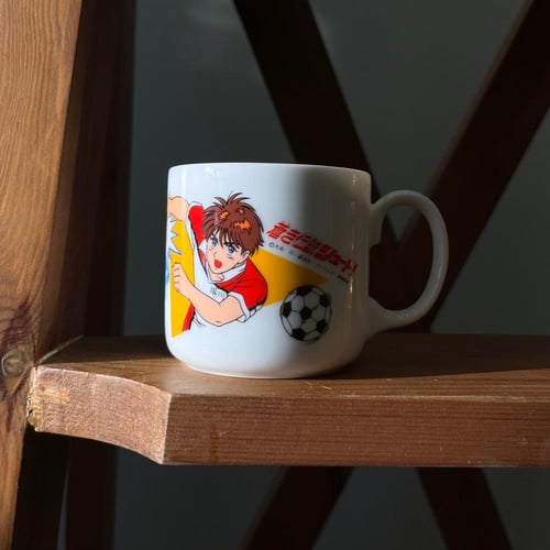 كوب سيراميك صناعة يابانية فنتج ونادر يحمل رسوم لشخ...