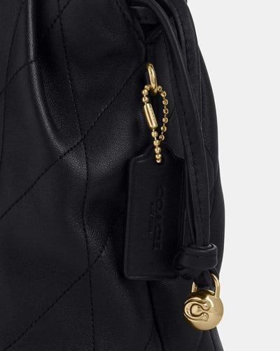 حقيبة فاي الصغيرة برباط / براند كوتش