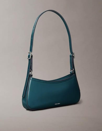 حقيبة كتف معدنية بشعار مونوغرام