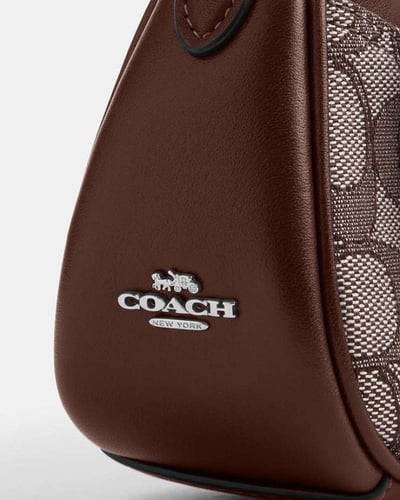 حقيبة كتف صغيرة من أشتون / براند كوتش