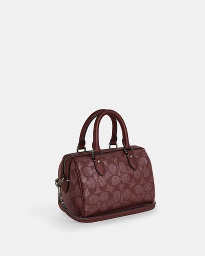 حقيبة كروس بودي ميني روان _ماركة كوتش