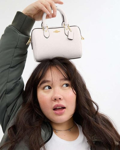 حقيبة كروس بودي ميني روان _ماركة كوتش