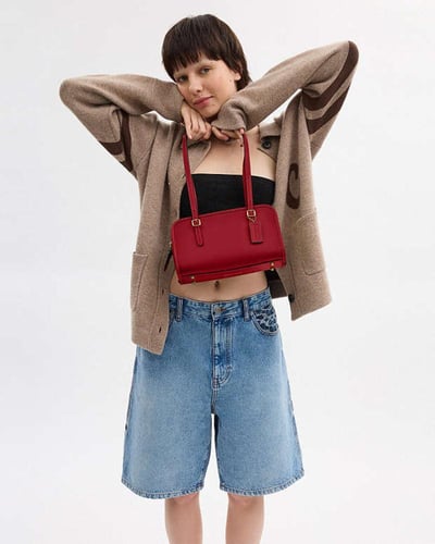 حقيبة Swing Zip / براند كوتش