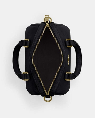 حقيبة كروس بودي ميني روان _ماركة كوتش