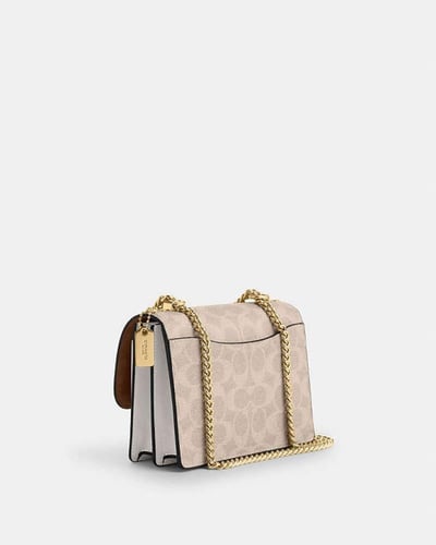 حقيبة كروس صغيرة من كلير/ماركة كوتش