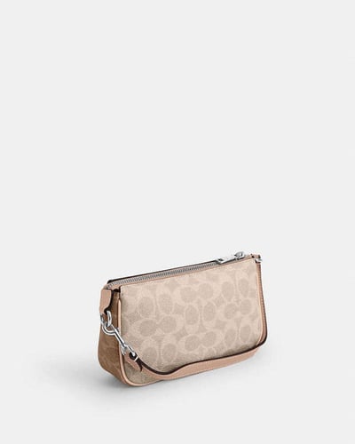 حقيبة نوليتا 19 في قماش التوقيع