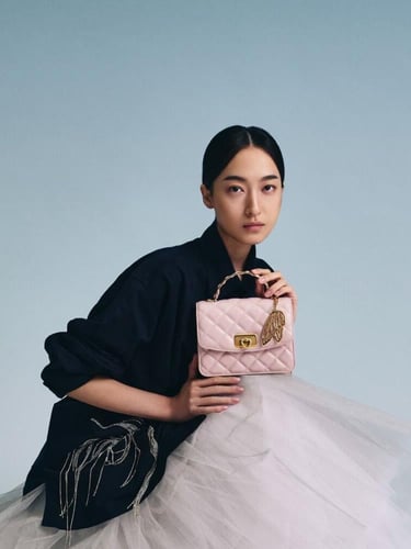 حقيبة كريسيدا المبطنة بمقبض علوي مع دلايات - وردي...