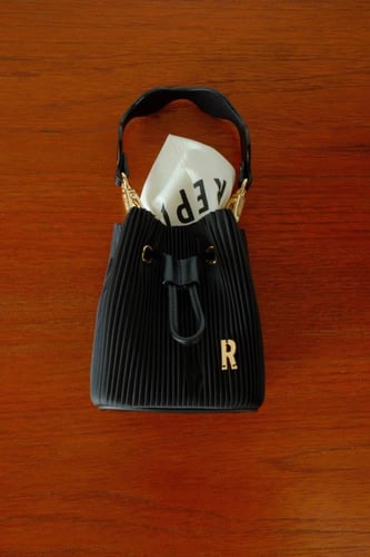 حقيبة دلو/ براند رييبلت