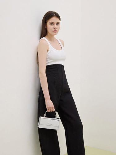 محفظة كريستين المعدنية الطويلة ذات المقبض المنحوت...