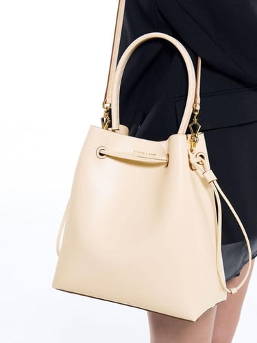 حقيبة هوبو برباط - بيج