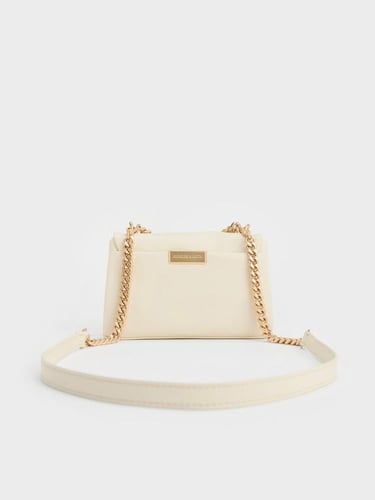 حقيبة كروس بودي صغيرة بمقبض سلسلة من كيري - كريمي