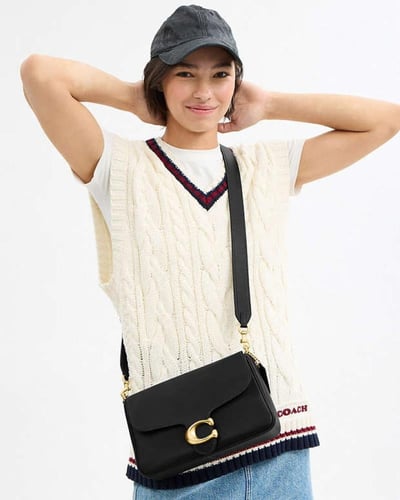 حقيبة كتف ناعمة من قماش التابي / براند كوتش