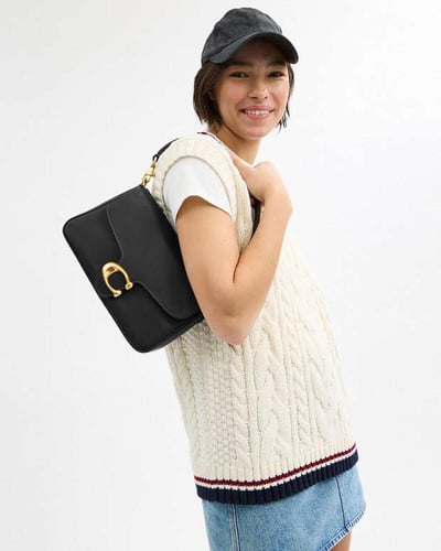 حقيبة كتف ناعمة من قماش التابي / براند كوتش