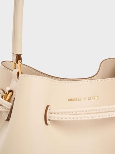 حقيبة هوبو برباط - بيج