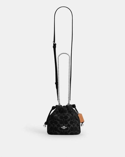 حقيبة فاي الصغيرة برباط / براند كوتش