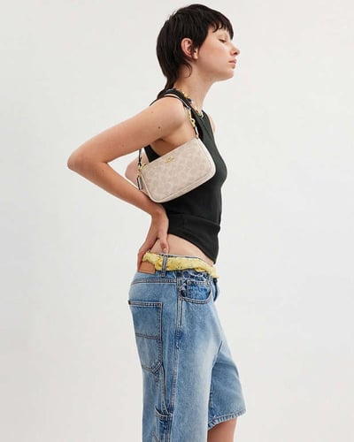 حقيبة نوليتا 19 في قماش التوقيع