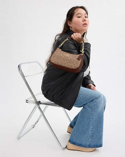 حقيبة كتف تيري اللون: ذهبي/ميرلوت