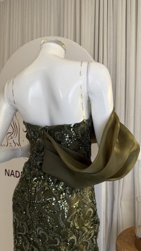 فستان تل مطرز زيتي طويل بكم لف من الأورجانزا