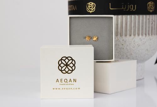 حلق دوار الشمس الذهبية من الذهب الاصفر عيار 21 قير...